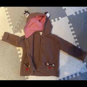 Cute reindeer sweater. In great condition as hardly worn.